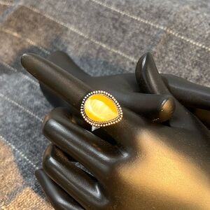 Faceted yellow quartz and sterling silver overlay ring